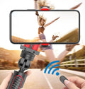 Aluminium alloy video balance stabiliser tripod for iPhone, extended with phone clamp attached.