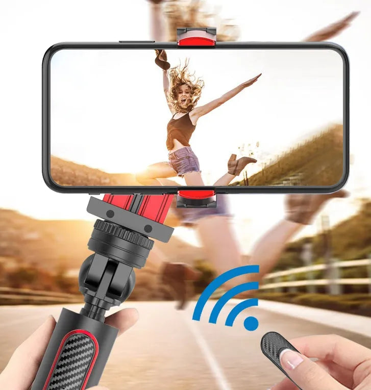 Aluminium alloy video balance stabiliser tripod for iPhone, extended with phone clamp attached.
