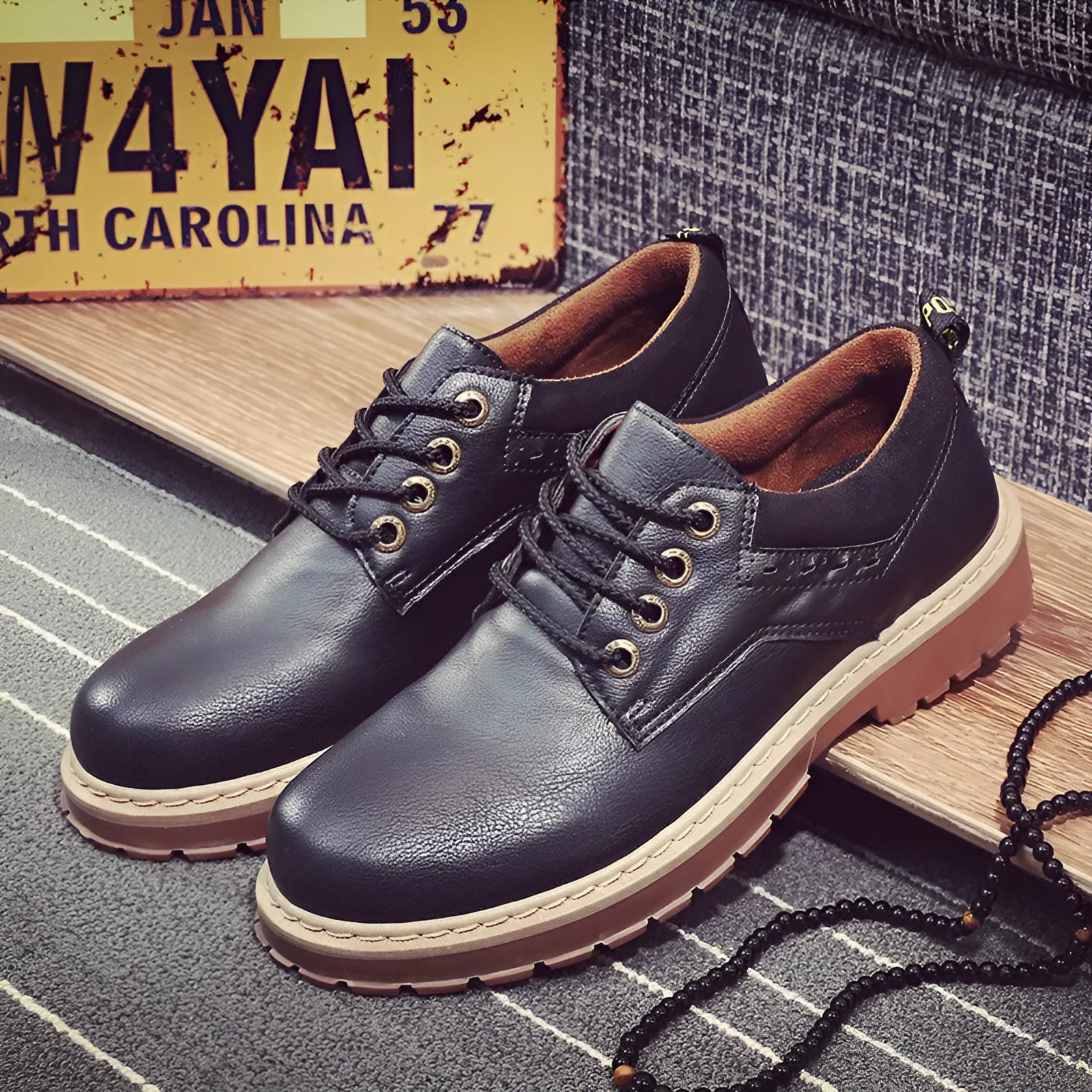Men's round-toe casual shoes with PU leather uppers and rubber soles in black, brown, and dark brown colours