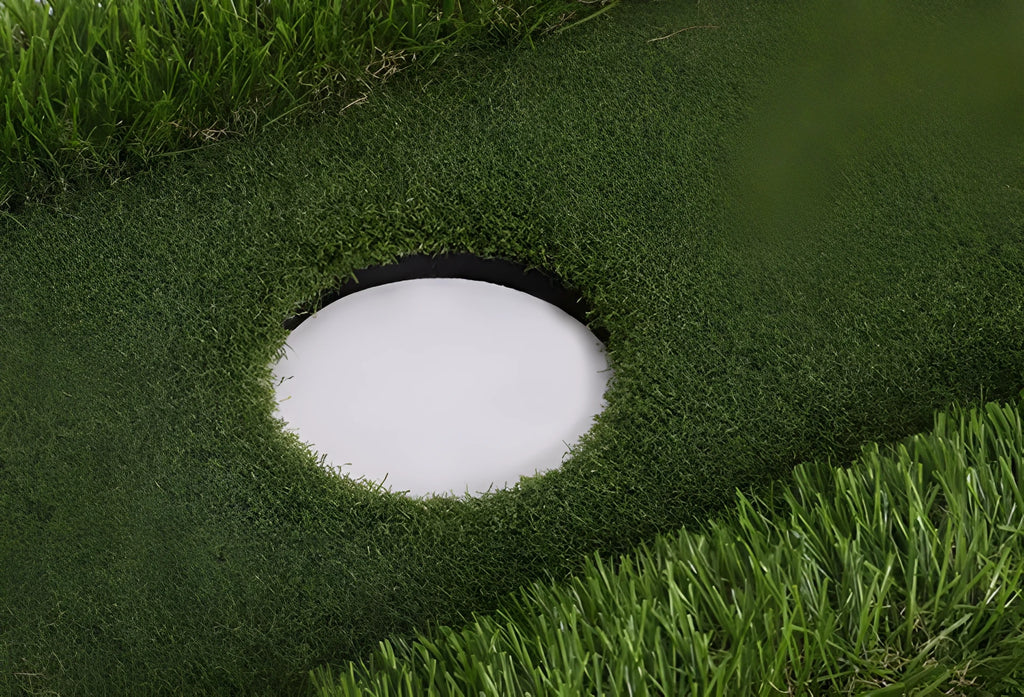 Green golf training mat with synthetic grass surface on a high elastic EVA foam base.