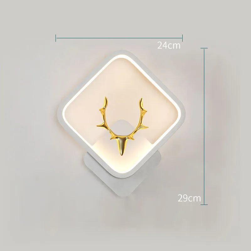 Deer antler shaped wall lamp with remote control on a light coloured wall
