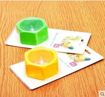 Yellow and green spiral vegetable cutter with food-grade plastic construction