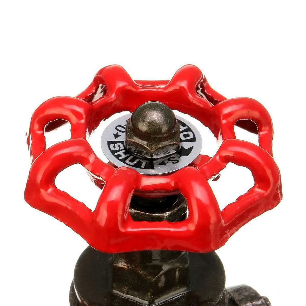 Steampunk industrial valve with red switch on grey copper tee body and wire fittings