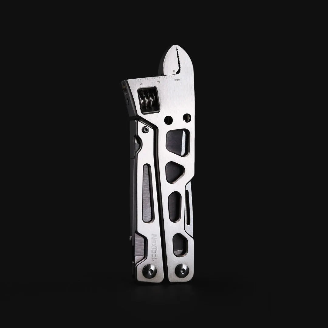 White stainless steel multi-function tool showing wrench, knife blade, and needle-nose pliers heads.