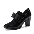 Women's black patent leather high heels with thick heel and square toe design