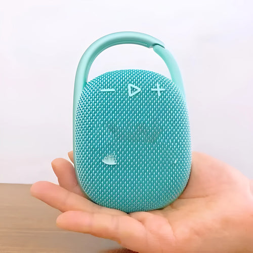 Mini portable Bluetooth speaker in multiple colours including pink, blue, black, red, silver grey, and green.
