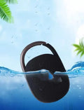 Mini portable Bluetooth speaker in multiple colours including pink, blue, black, red, silver grey, and green.