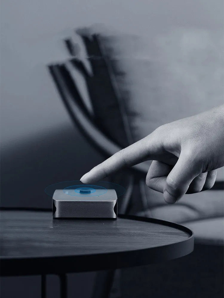 Grey Haibeisi HDMI switcher device with two input ports and one output port for 4K video switching.