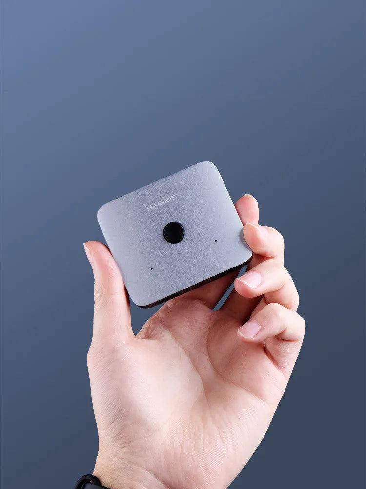 Grey Haibeisi HDMI switcher device with two input ports and one output port for 4K video switching.