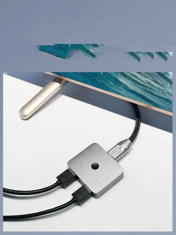 Grey Haibeisi HDMI switcher device with two input ports and one output port for 4K video switching.