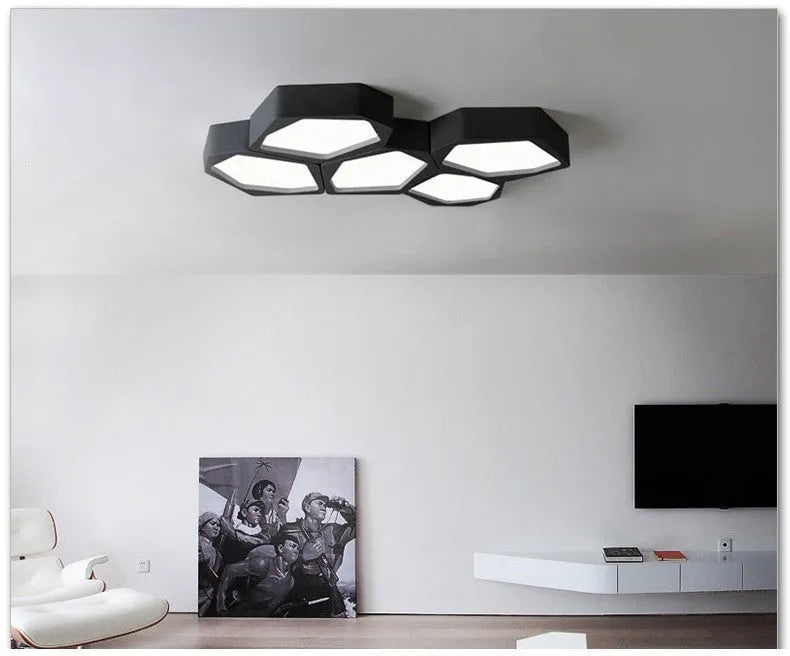 Geometric patterned LED wall light panel with iron frame in black or white finish