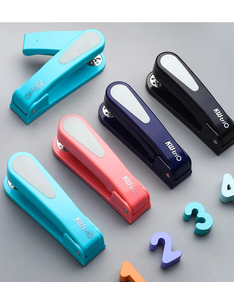 360-degree rotatable desktop stapler in black, showing rotation function and centre seam binding.
