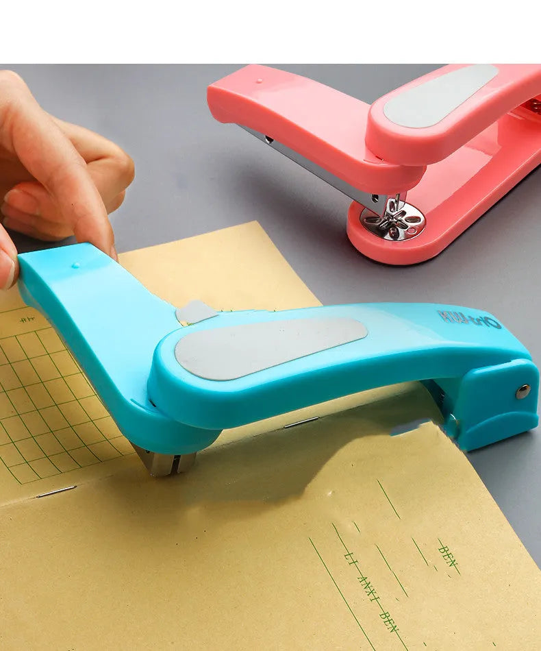 360-degree rotatable desktop stapler in black, showing rotation function and centre seam binding.