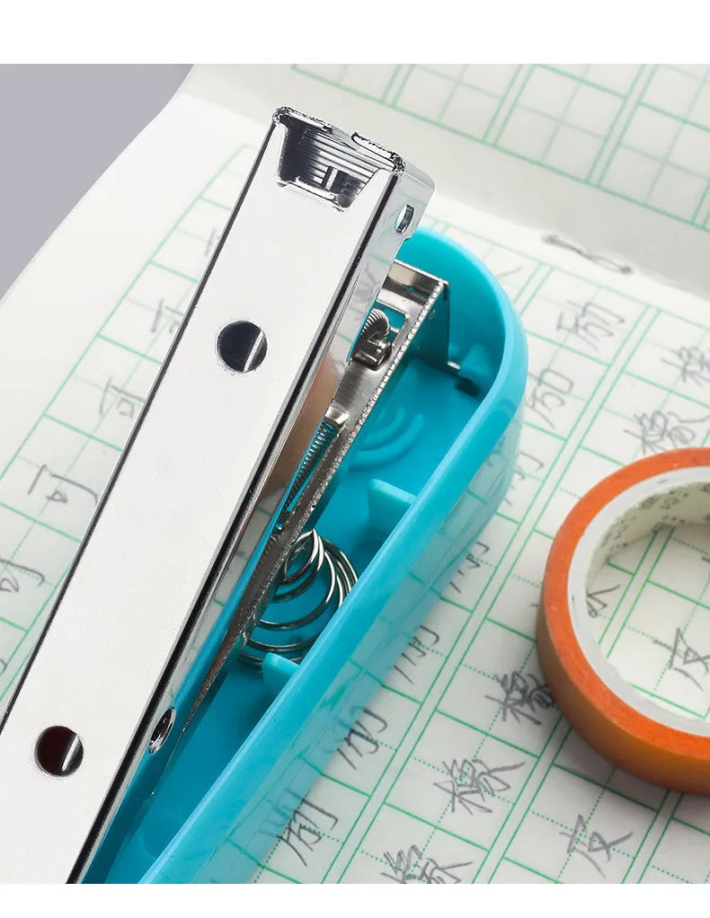 360-degree rotatable desktop stapler in black, showing rotation function and centre seam binding.