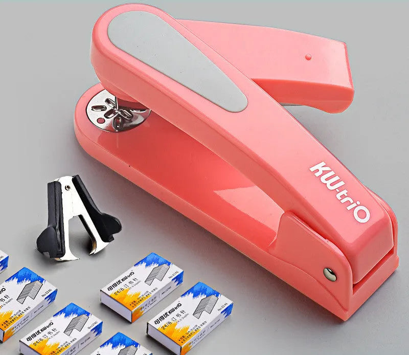 360-degree rotatable desktop stapler in black, showing rotation function and centre seam binding.
