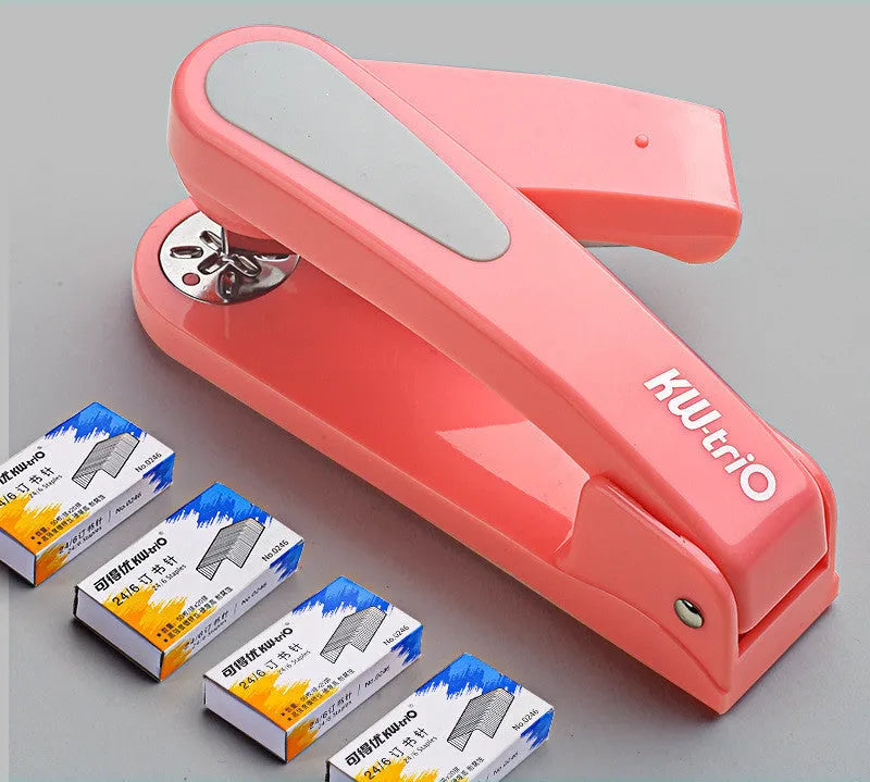 360-degree rotatable desktop stapler in black, showing rotation function and centre seam binding.