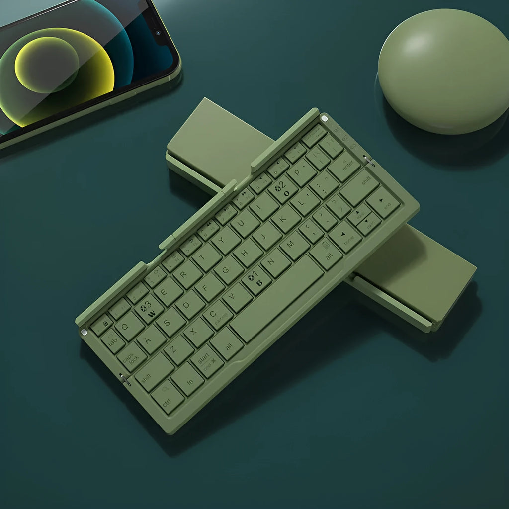Aluminium folding Bluetooth keyboard open with smartphone on stand showing silver white finish