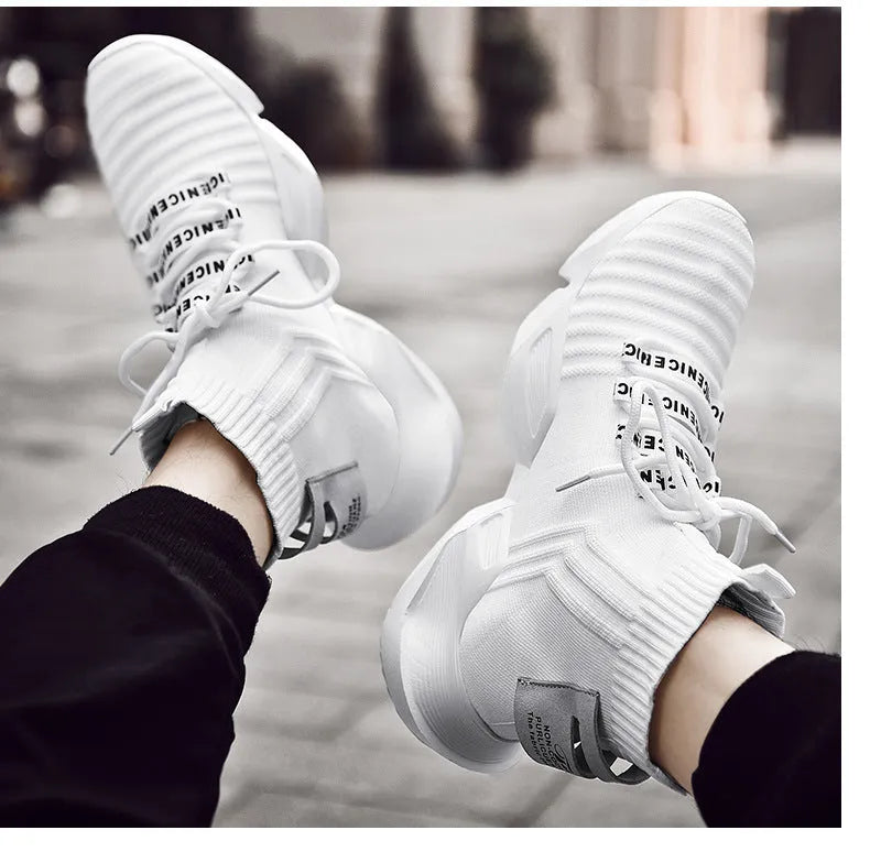 Men's black and white sports casual shoes showing mesh inside and extended sizing options