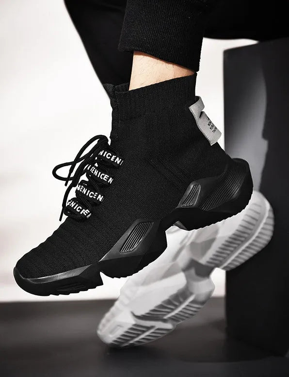 Men's black and white sports casual shoes showing mesh inside and extended sizing options