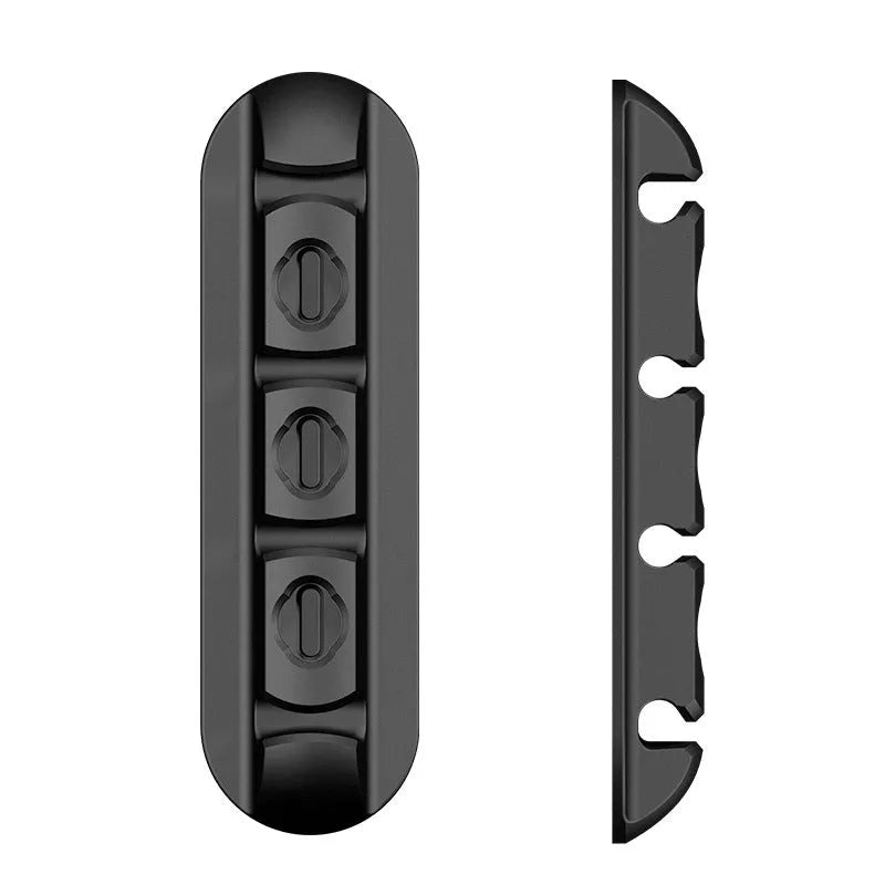 Black soft plastic desktop magnetic cable organiser for charging station cable management