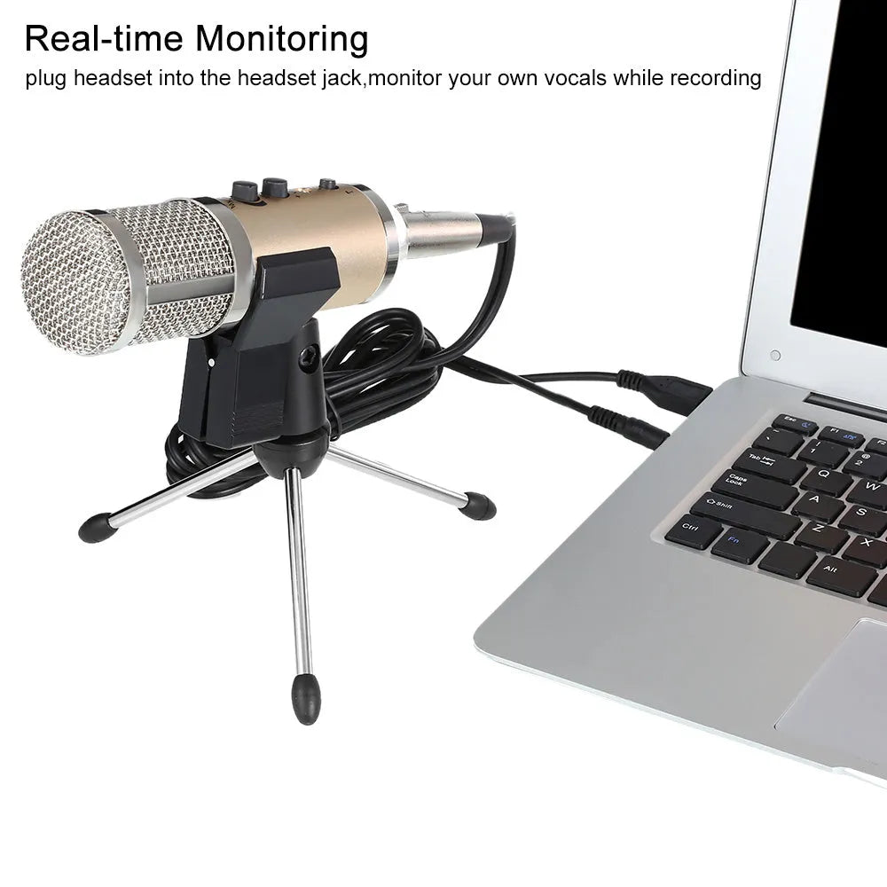 Gold wireless condenser microphone with built-in stand on a desk
