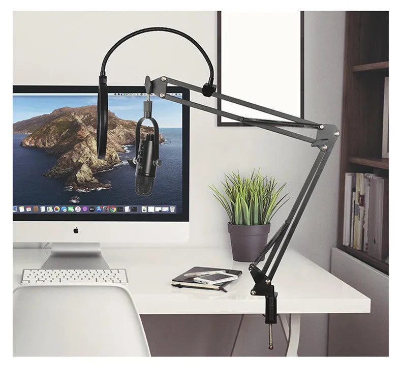 Black USB condenser microphone on metal stand with foam cover for desktop recording