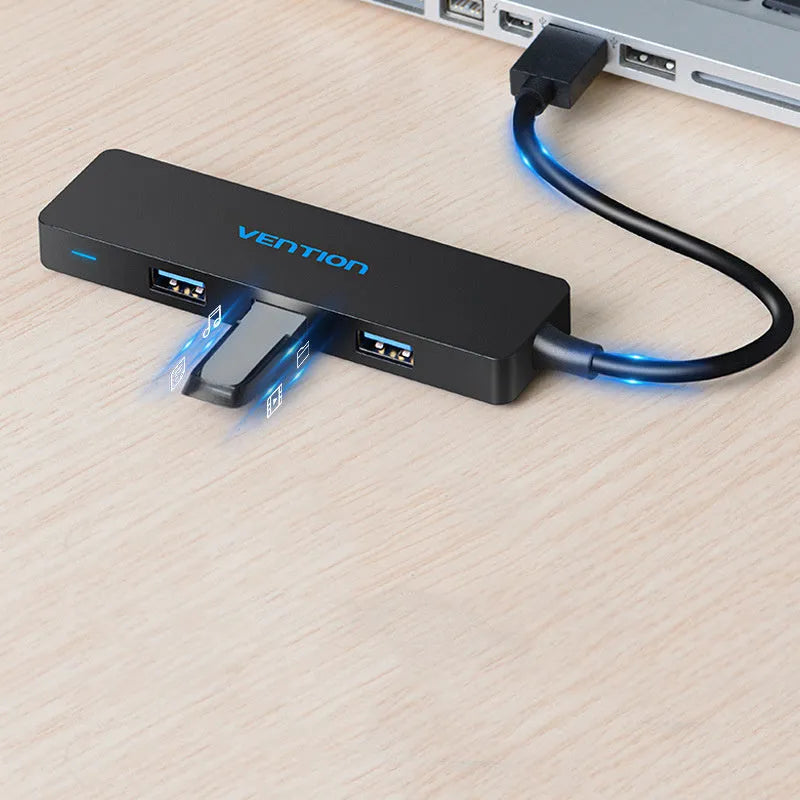 Black four-port USB 3.0 hub with 0.15 metre cable showing nickel-plated interfaces