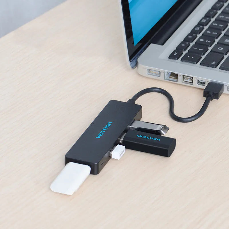 Black four-port USB 3.0 hub with 0.15 metre cable showing nickel-plated interfaces