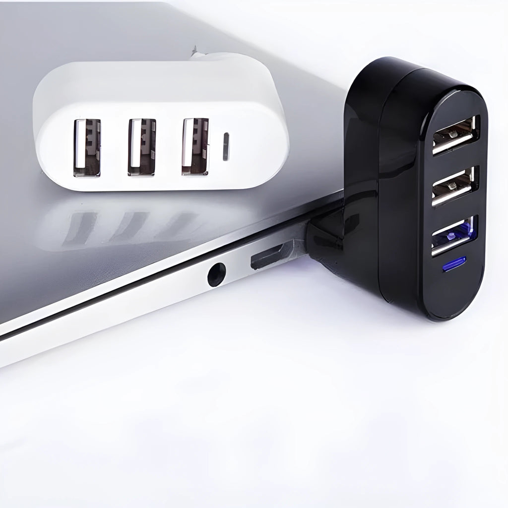 Black and white 4-port USB 2.0 splitter hub shown next to a laptop