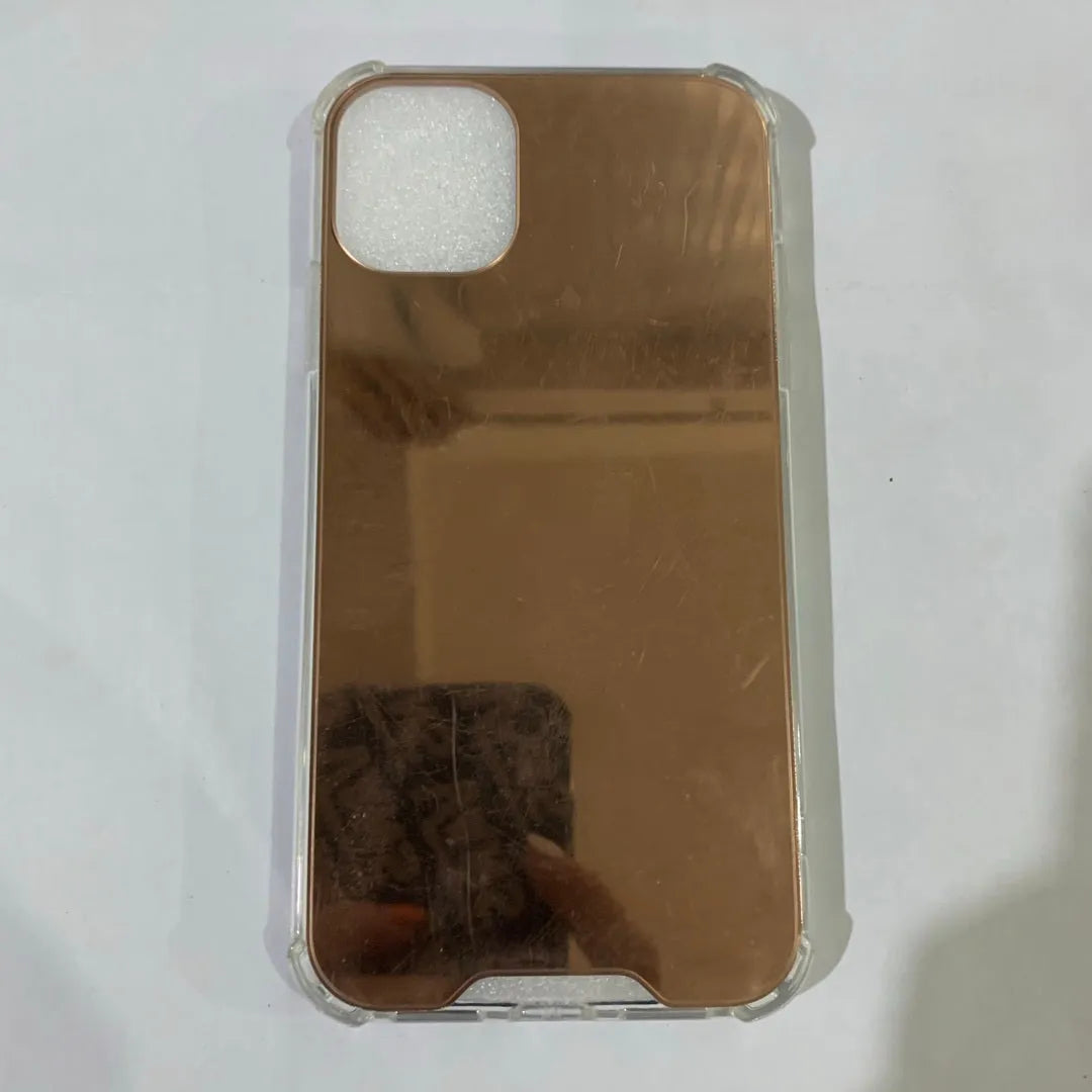 Mirror finish TPU protective case shown on iPhone with colour options displayed.