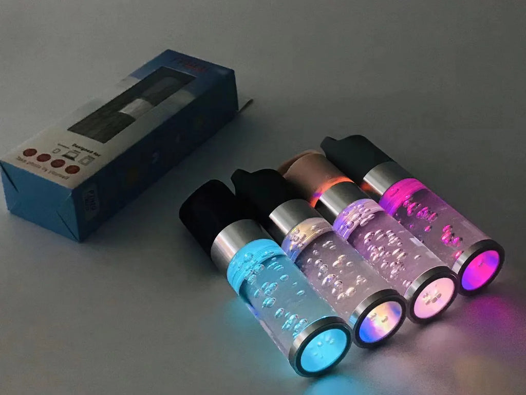 Portable Bluetooth speaker with colourful crystal lights in pink, black, silver grey, or green options