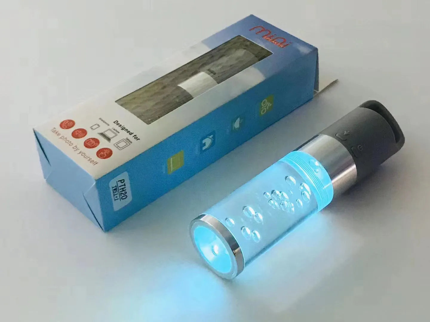 Portable Bluetooth speaker with colourful crystal lights in pink, black, silver grey, or green options
