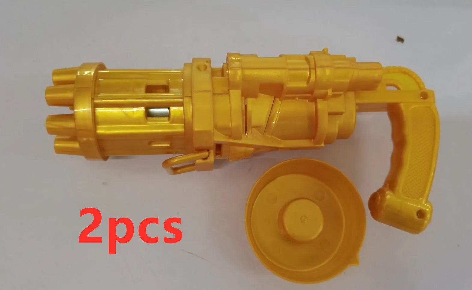 Child's plastic bubble blower gun in pink, gold, or black with removable bubble head for use as a fan.