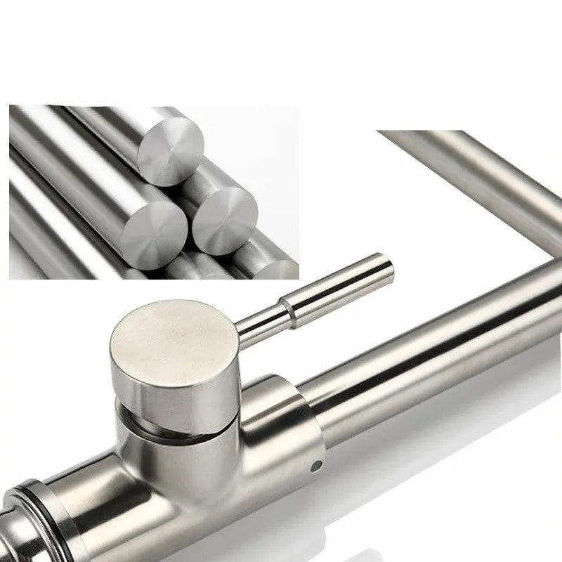 Silver stainless steel kitchen tap with two handles and rotating spout