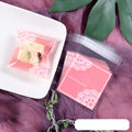 Pink self-adhesive plastic packaging bag for handmade soap with UV printed labelling