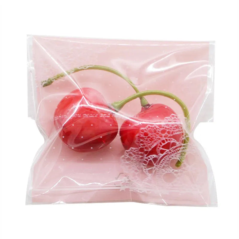 Pink self-adhesive plastic packaging bag for handmade soap with UV printed labelling