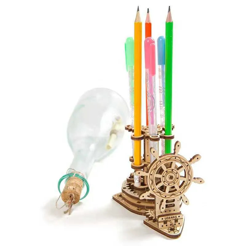 Ukrainian handmade wooden rotating pen holder with steering wheel mechanism on desk