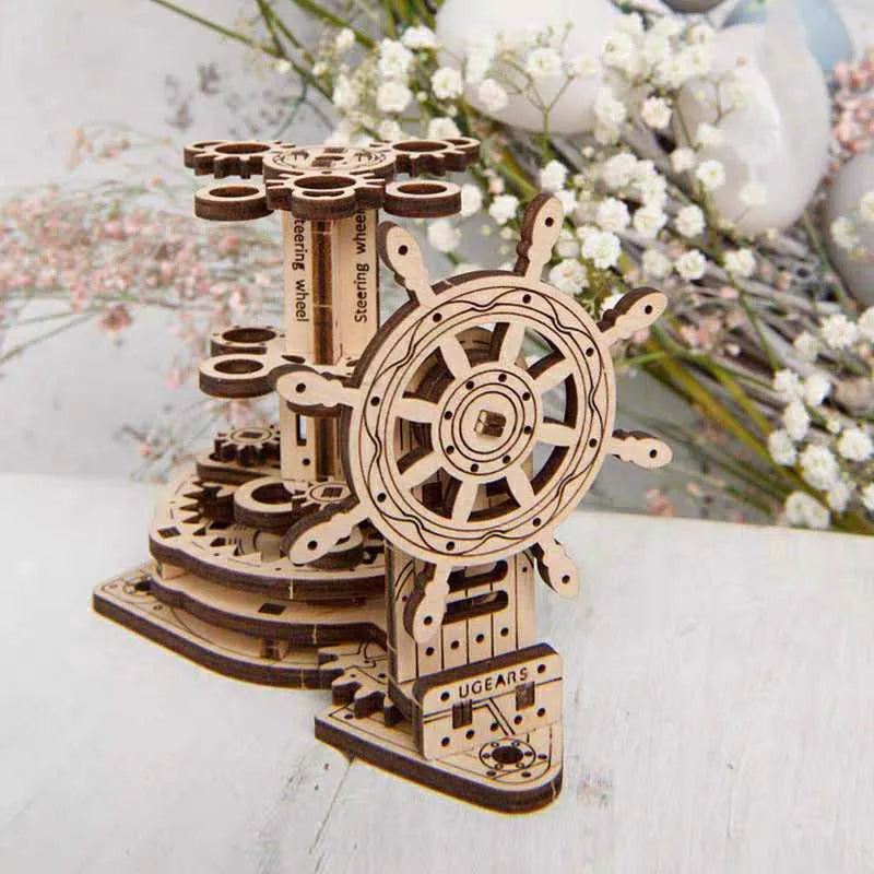 Ukrainian handmade wooden rotating pen holder with steering wheel mechanism on desk
