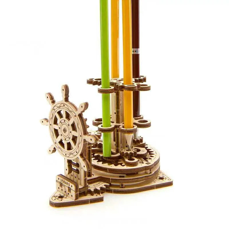 Ukrainian handmade wooden rotating pen holder with steering wheel mechanism on desk