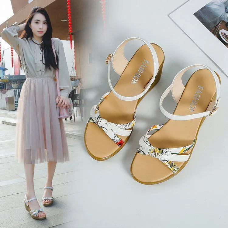 Women's pink PU wedge sandals with a thick heel, fish mouth toe, and buckle strap.