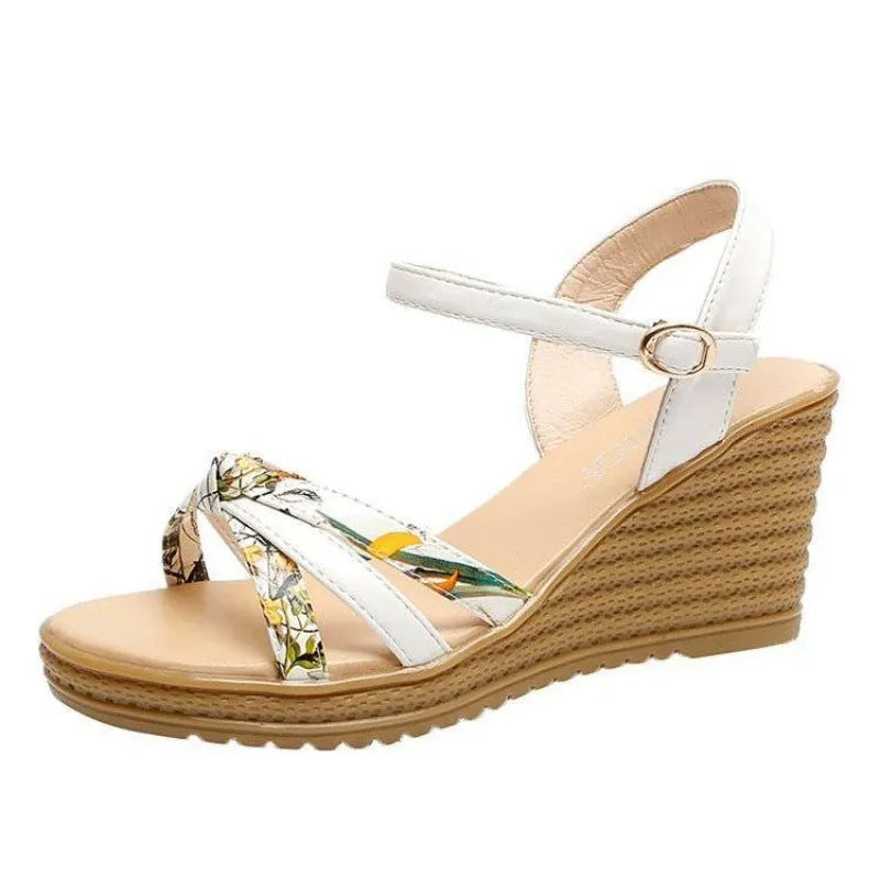 Women's pink PU wedge sandals with a thick heel, fish mouth toe, and buckle strap.