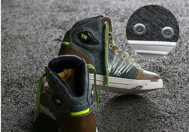 Black and grey motorcycle riding shoes showing short boot design with anti-fall sole pattern