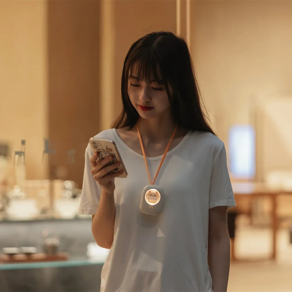 White hanging neck USB fan with 1200mAh battery and three speed settings