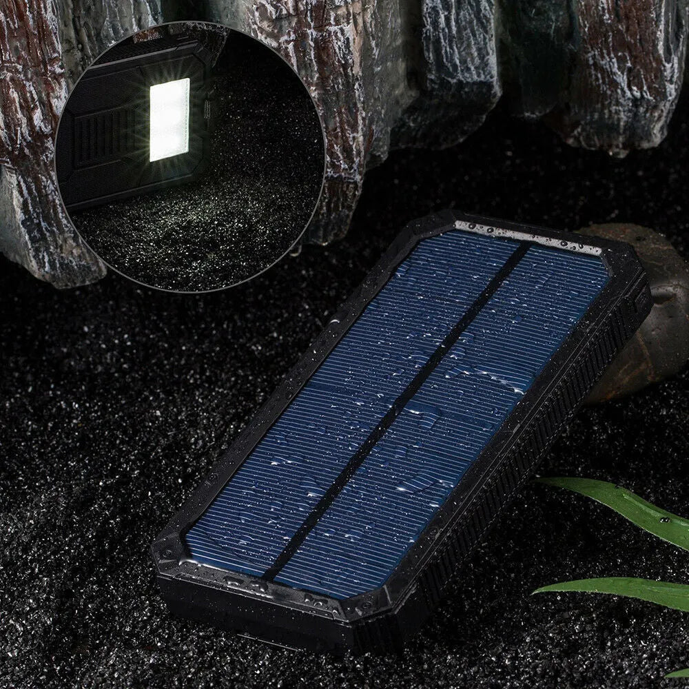 Orange 20000 mAh solar power bank showing multiple USB ports and solar panel
