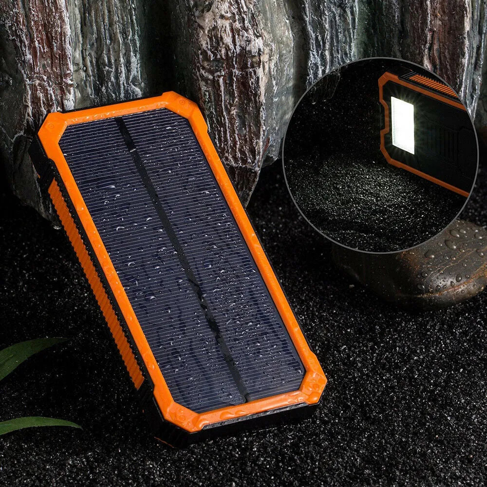 Orange 20000 mAh solar power bank showing multiple USB ports and solar panel