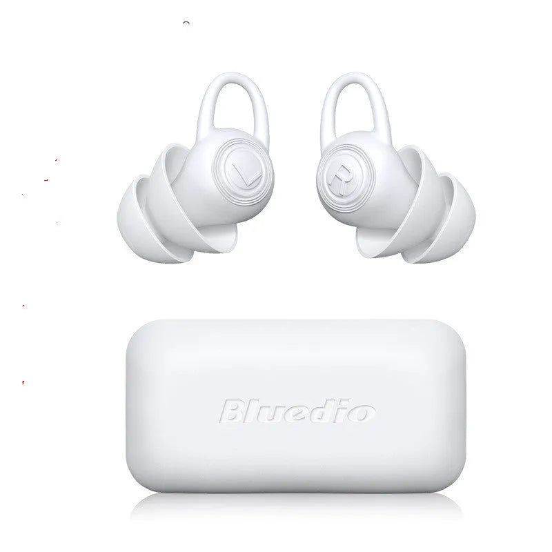 White soft silicone ear plugs for noise reduction in sealed packaging
