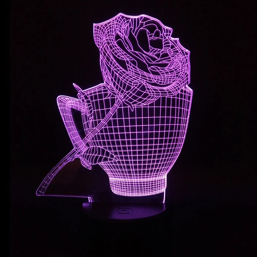 3D rose flower shaped night light glowing with multi-coloured LEDs on a black ABS base.