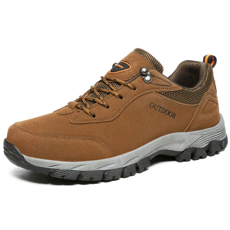 Men's army green low-top hiking shoes on a neutral background, showing the casual design and tread.
