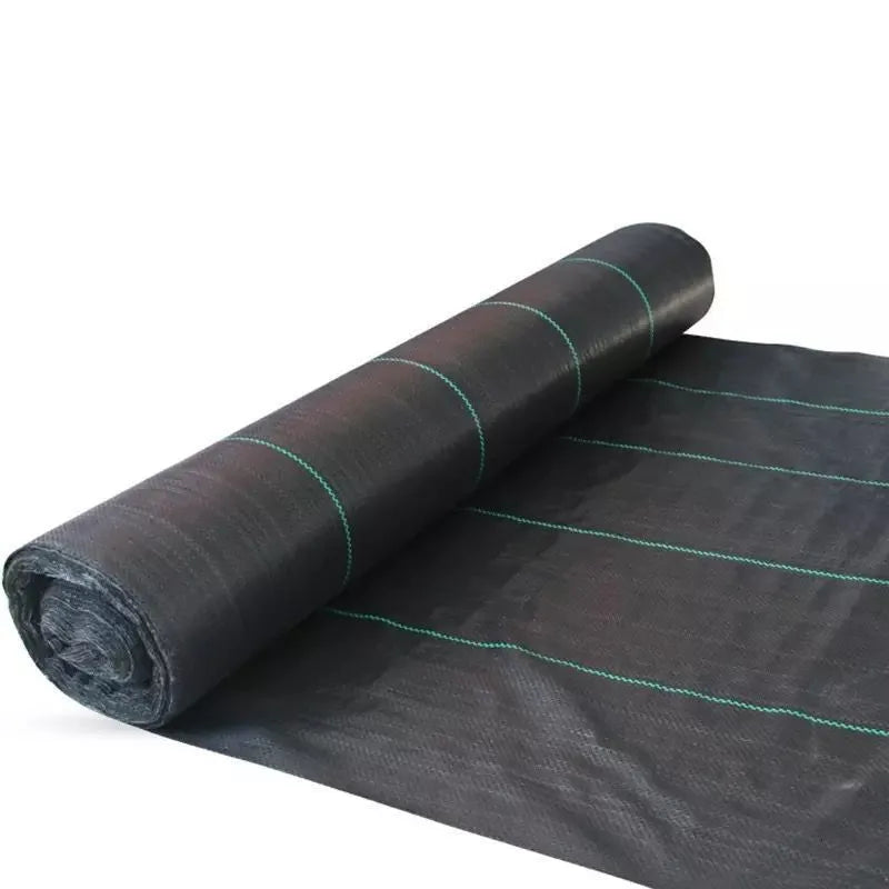 Black polyethylene weed-proof cloth laid out on soil for greenhouse or farmland ground cover.