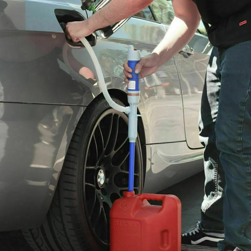 Blue and red manual hand pump for siphoning fuel and oil from containers